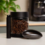 Includes RDT spray, dosing tray and vacuum storage container for coffee beans.